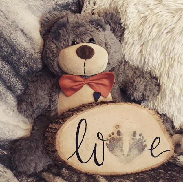 Jensen Bear with Love Wood Slice.png